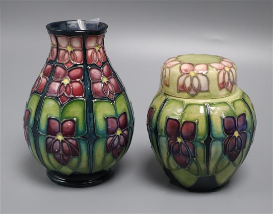 A Moorcroft violet vase and a lidded jar vase 14cm